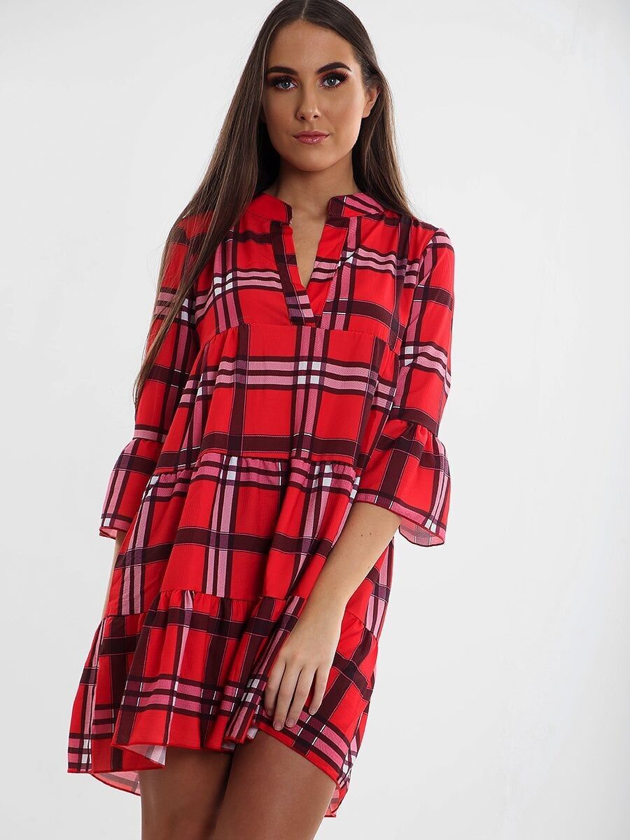 Abito grembiule con balze a quadri tartan