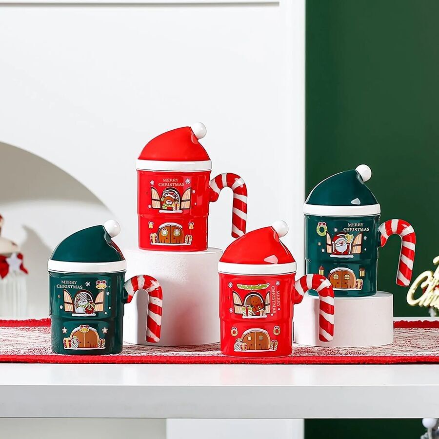 Christmas ceramic mug with cap and lollipop handle in 4 designs. Dimension: 8.3x14.3cm Capacity: 320ml LM-808