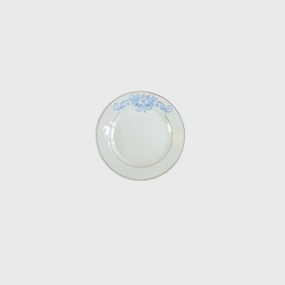 Plato llano vintage con flor azul