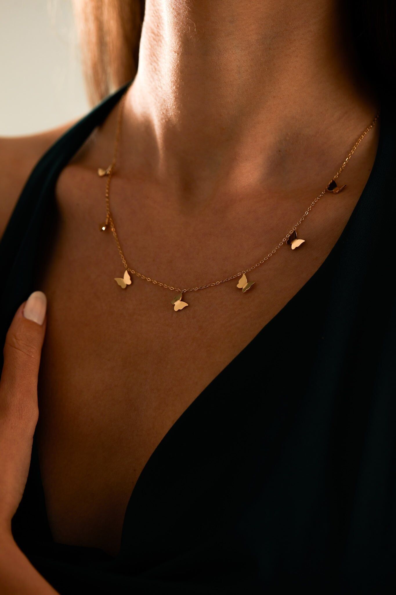 COLLANA CON CHARM FARFALLA