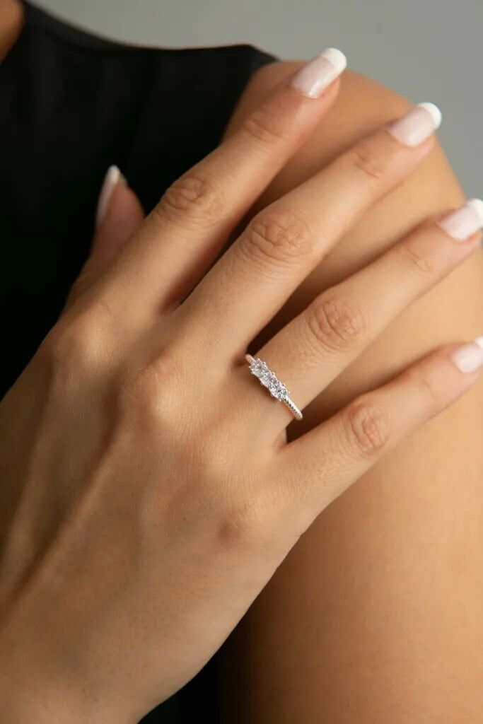 ANELLO IN ARGENTO TRIPLO INTRECCIATO