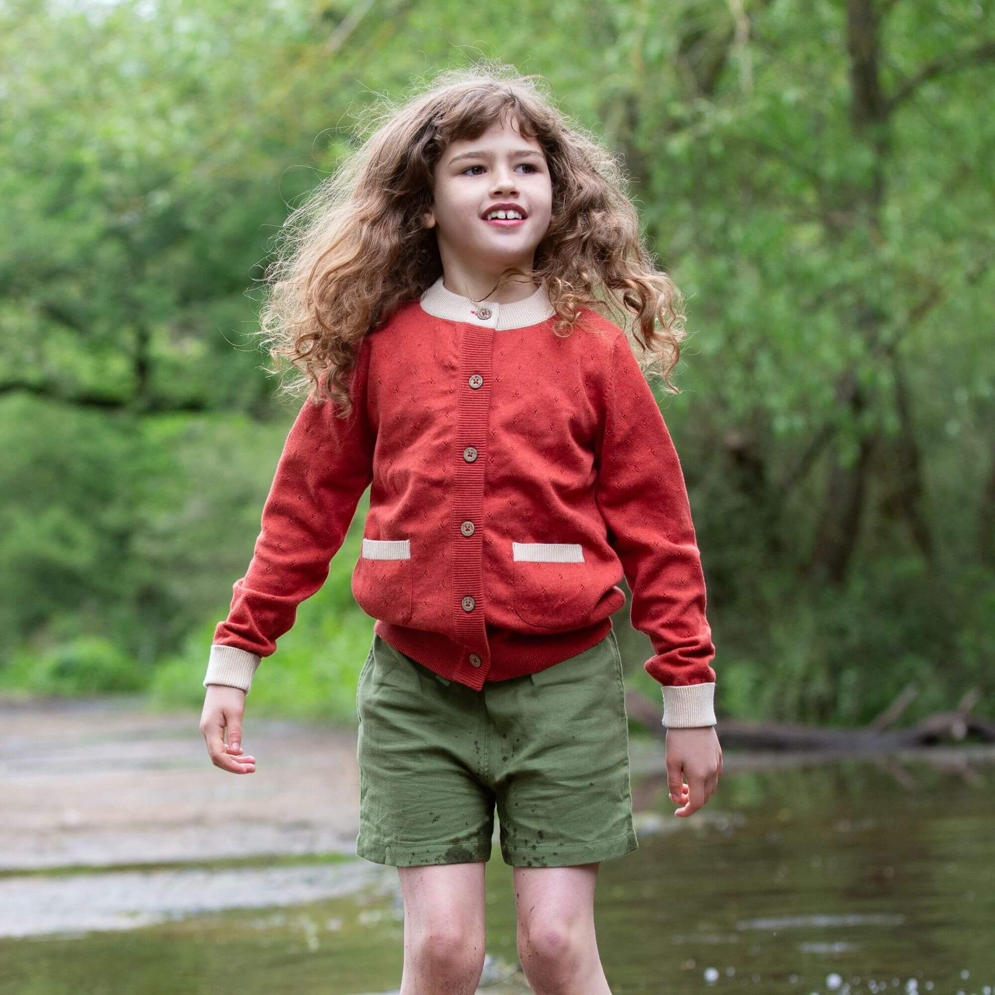 Cárdigan de punto pointelle en ocre quemado de From One To Another