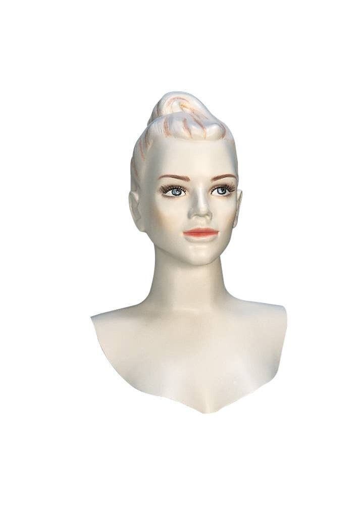 Frauenkopf mit Make-up-Gesicht mit zusammengebundenen Haaren