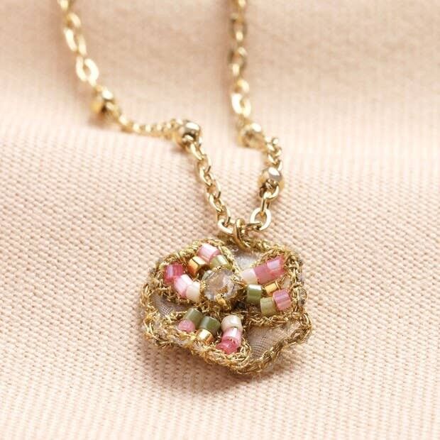 Collana con ciondolo a forma di fiore in acciaio inossidabile dorato