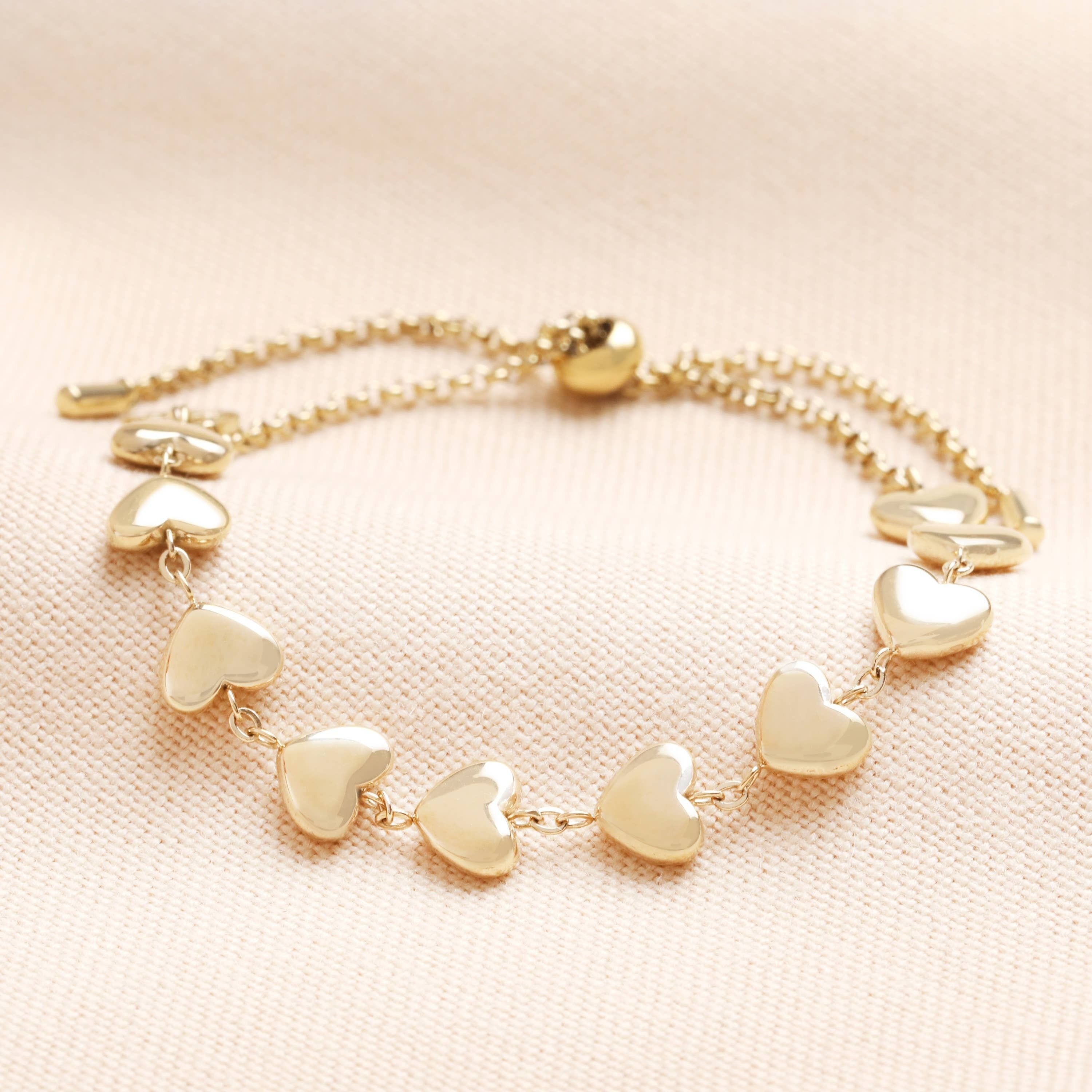 Braccialetto con ciondolo a forma di cuore in acciaio inossidabile color oro