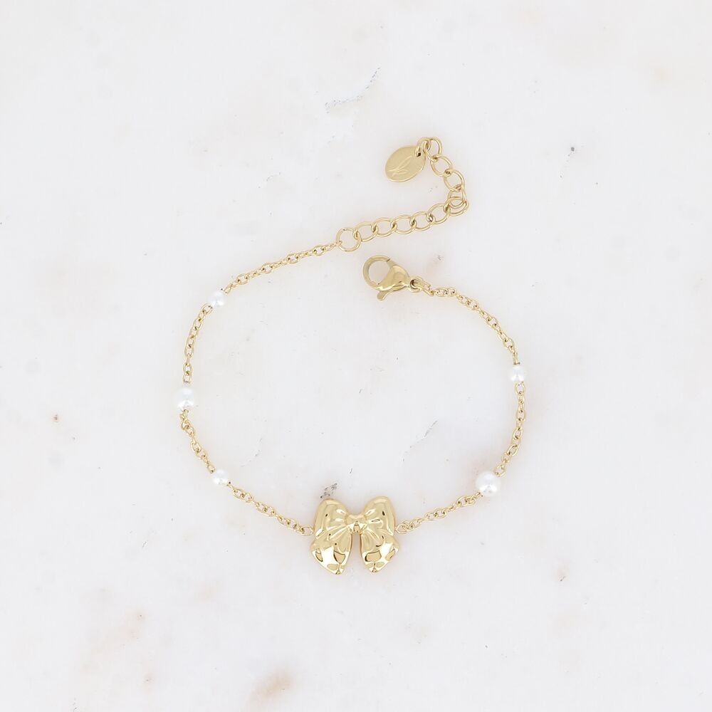 Bracciale: papillon e perline in resina bianca