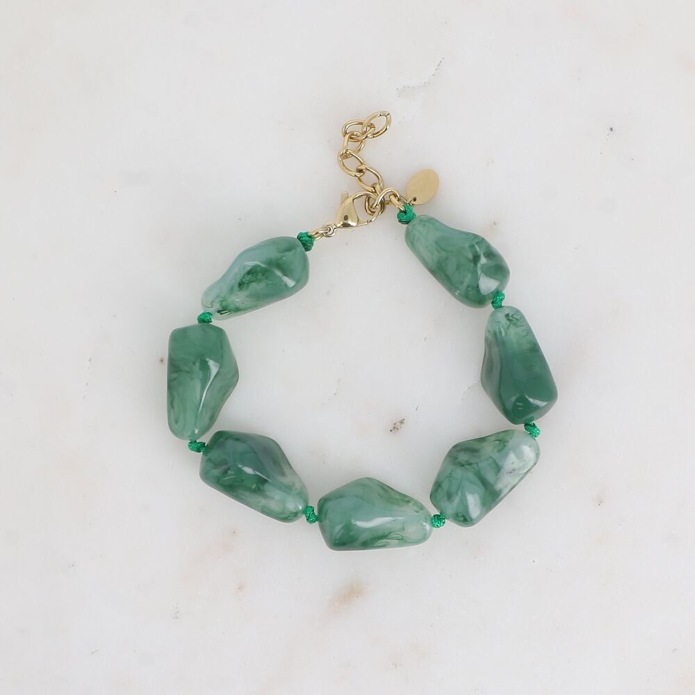 Bracelet on cord - pieces of colored resin