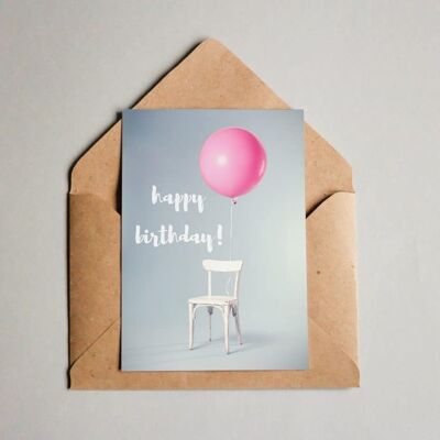 Chaise de joyeux anniversaire de carte postale