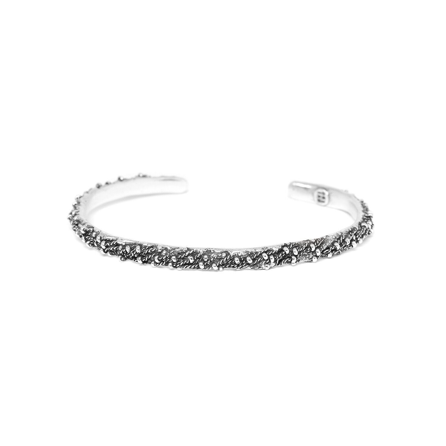CUFF bracciale rigido in argento con trama a catena