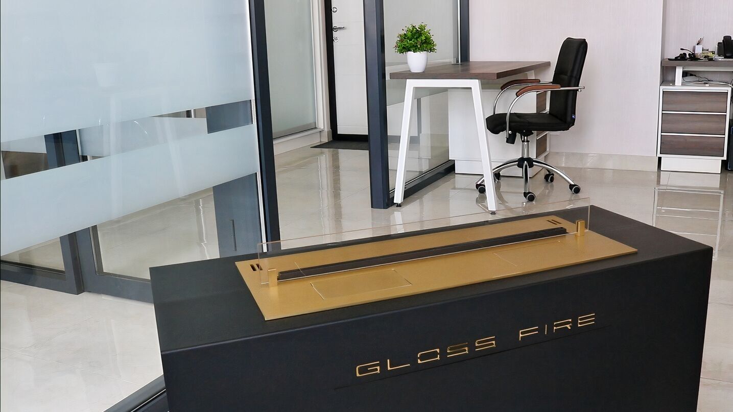 Cheminée étanol dorée