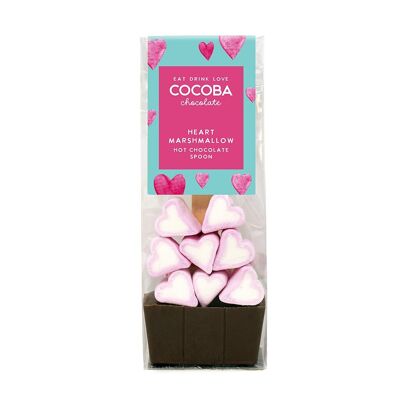 Cuillère à chocolat chaud au lait avec guimauves coeur