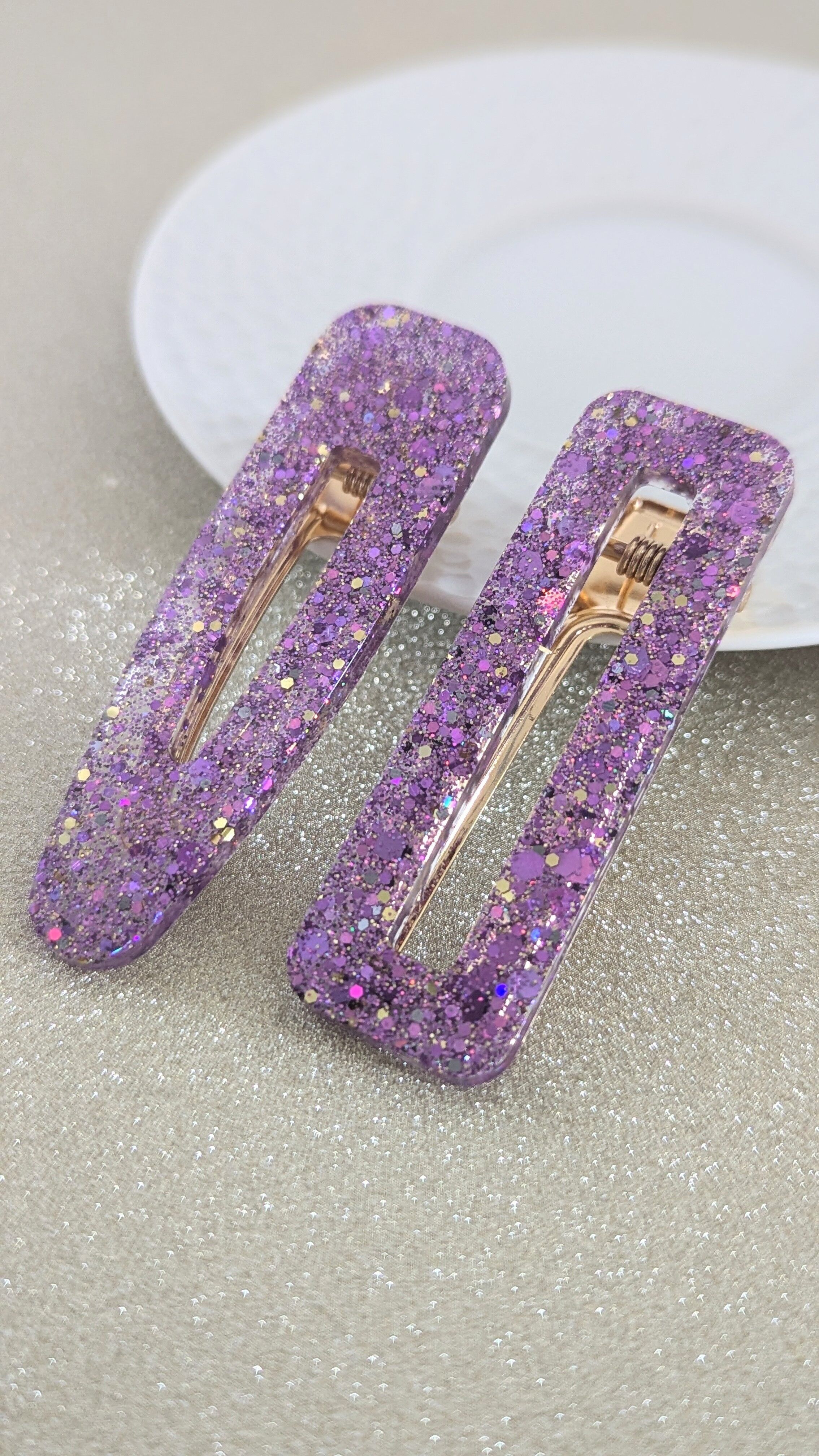 Fermacapelli con paillettes viola