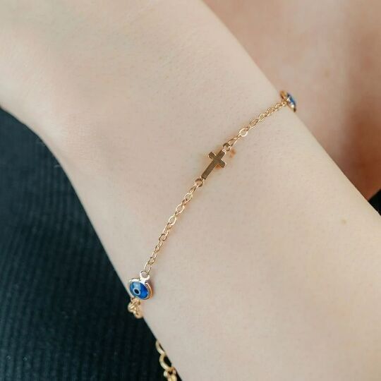 Christliches Schutzarmband mit Kreuz und bösem Blick aus Gold und Silber