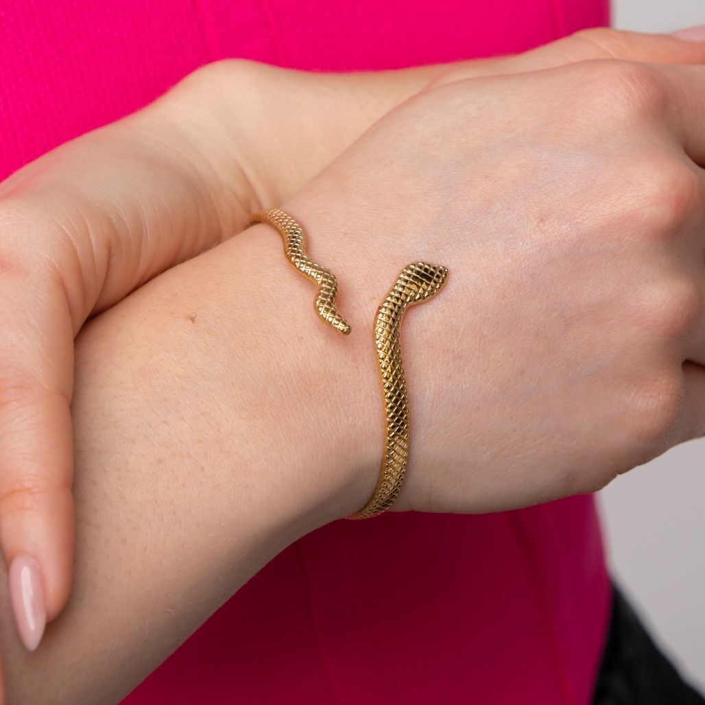 Bracciale rigido a polsino aperto sottile a forma di serpente placcato oro in acciaio inossidabile