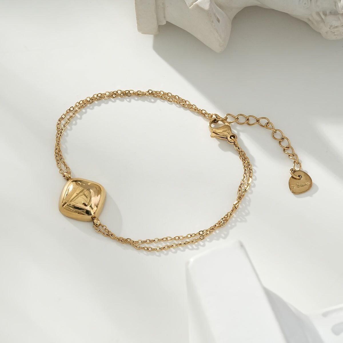 Bracciale Dorato Regolabile A Doppia Catena Con Spessa Placca Diamantata