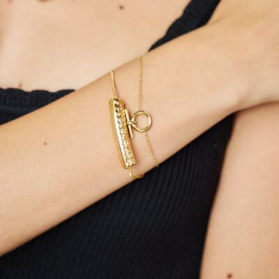 Bracciale regolabile in oro con catena a serpente con grandi punti incisi su barra