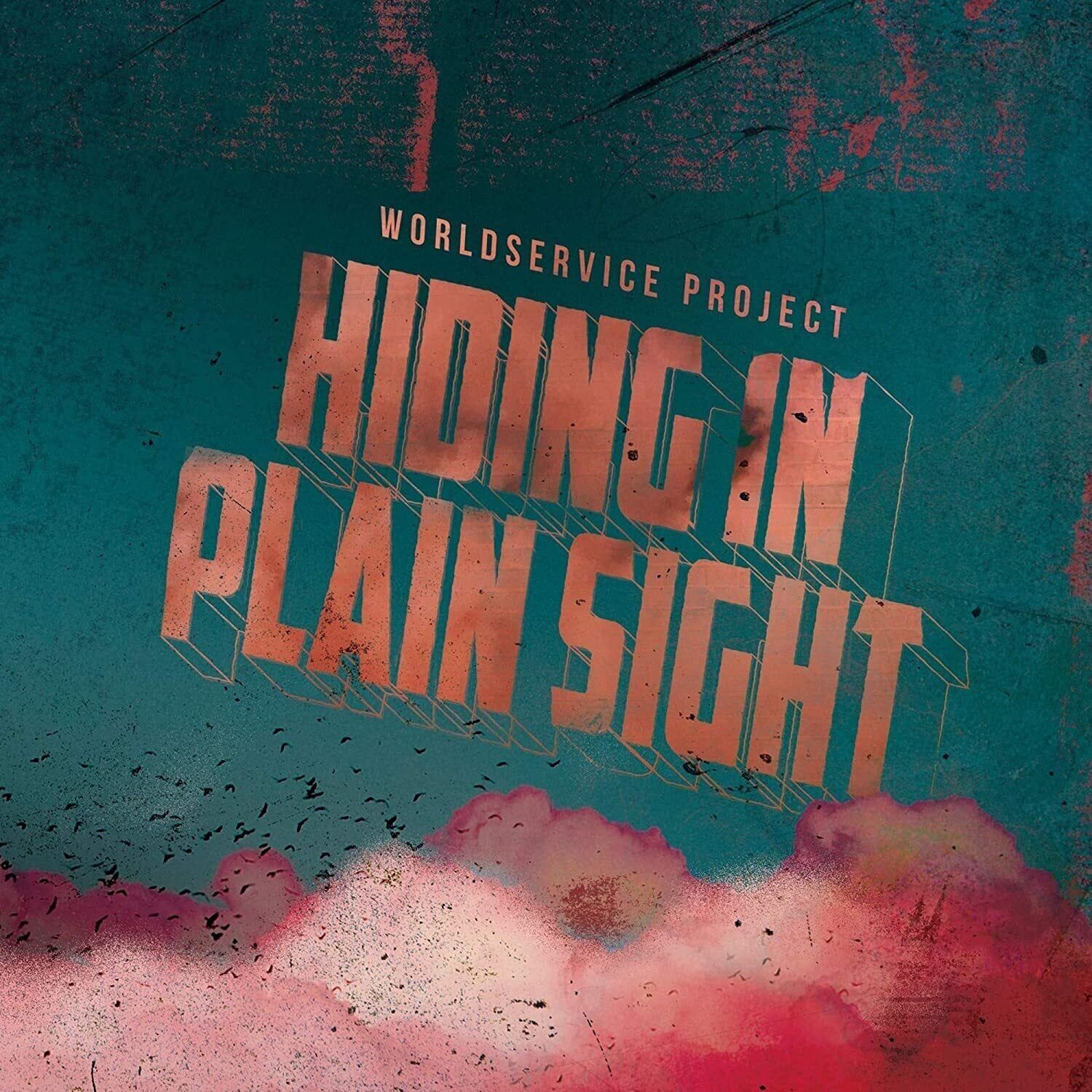 Worldservice Project LP - Hiding In Plain Sight (Vinile trasparente rubino)