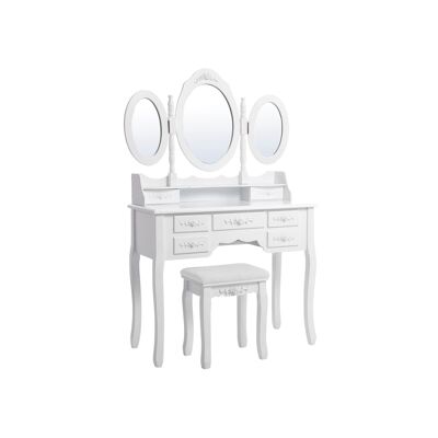 Une belle table de chevet avec 3 miroirs