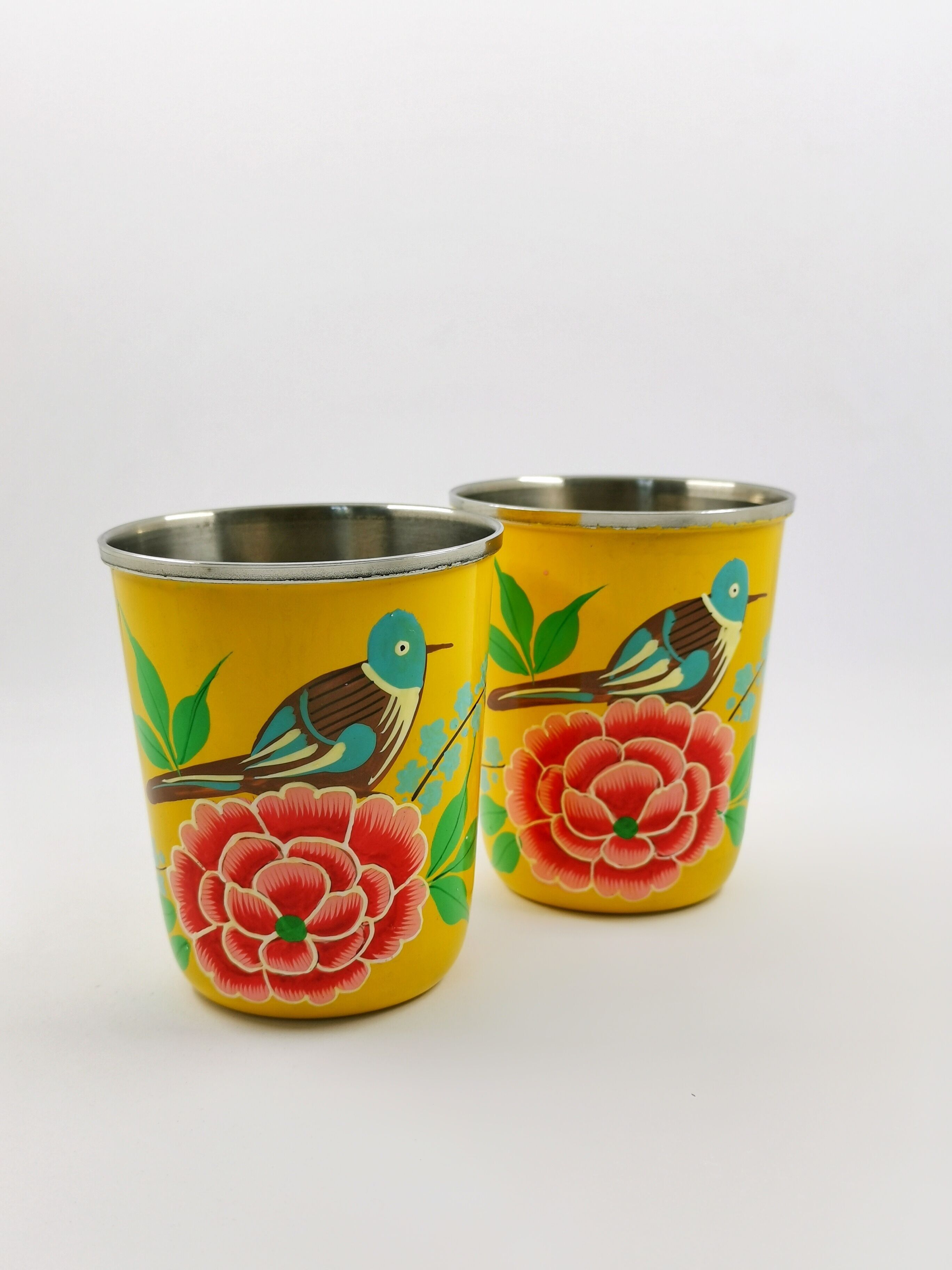 Indian glass in yellow enamel with hand-painted flower pattern