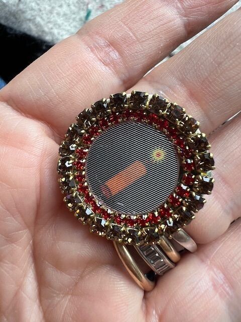 spilla con immagine lenticolare