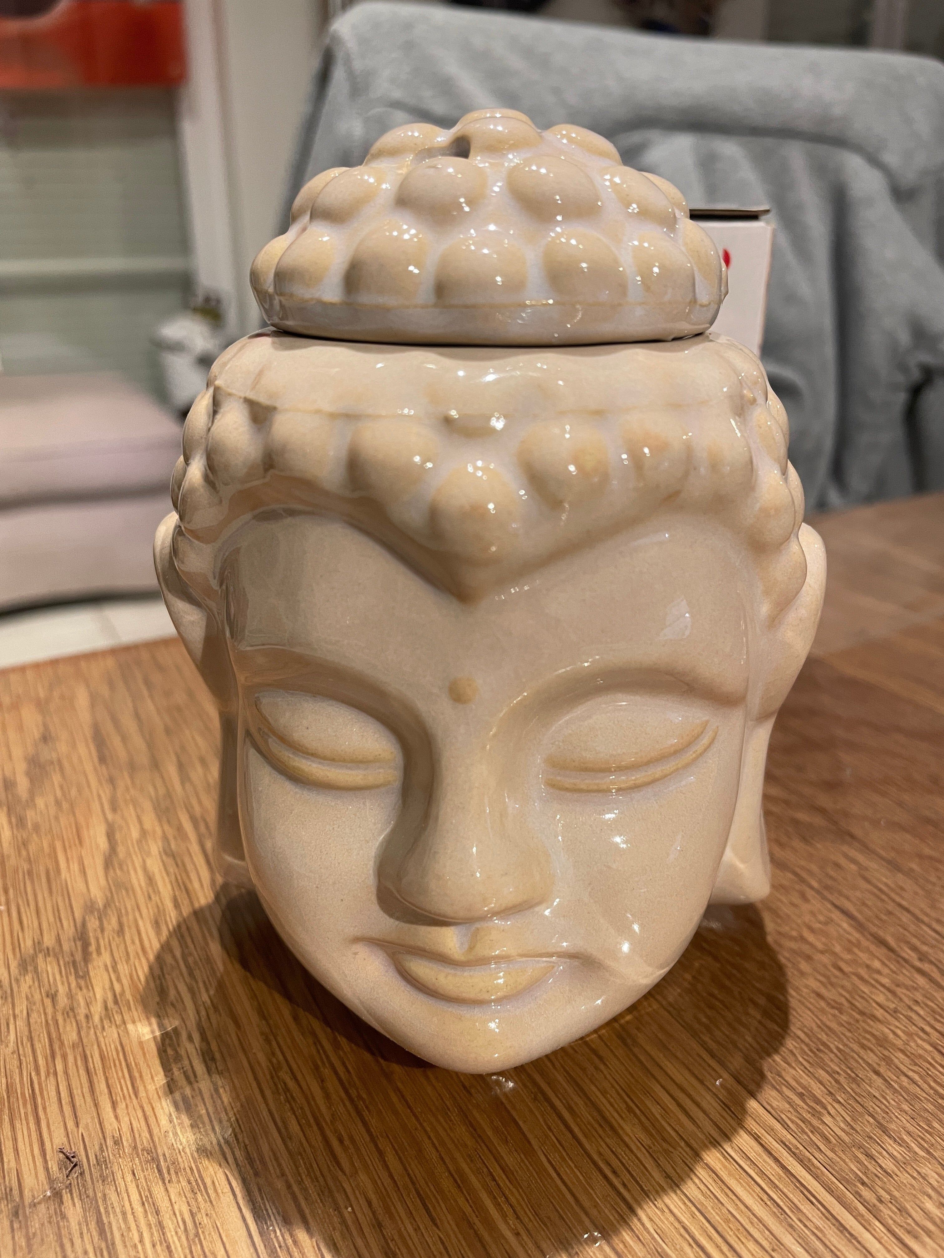 Salmon colored Buddha head burner