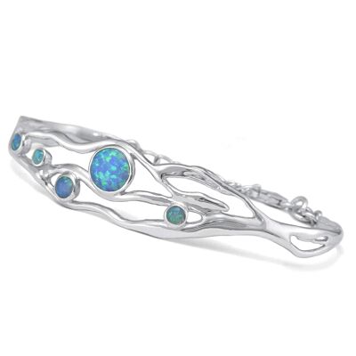 Organic silver bangle decorated with opals, hand made from sterling silver.