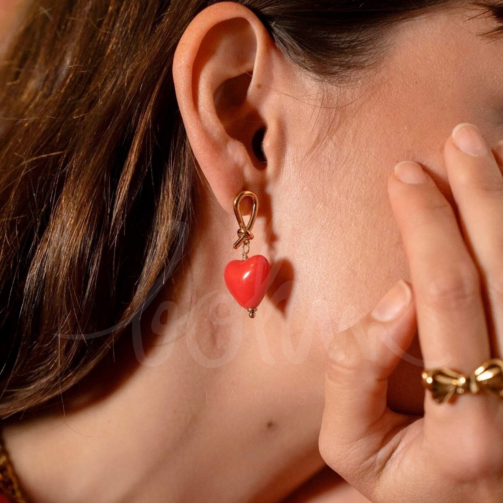 Carleeni stud earrings - colored acetate heart