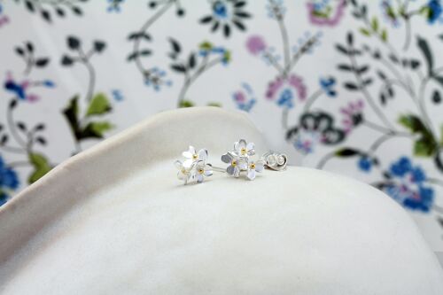 Dainty Silver Flower Stud Earrings with Gold plated centers.