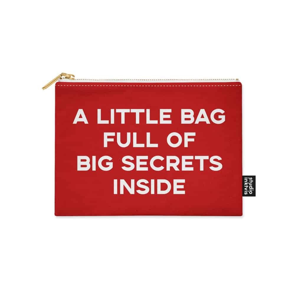 A little bag full of big secrets inside makeup bag pouch red