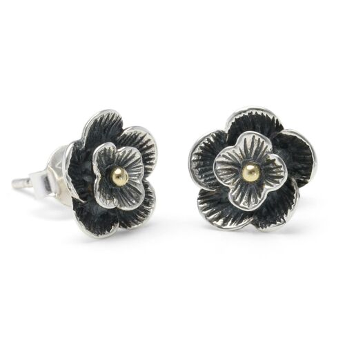 Oxidised silver flower stud earrings with gold centre
