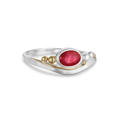 Hand Made Ruby ring with gold details in Sterling Silver.