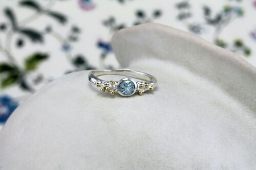 Hand Made sterling Silver Ring with Blue Topaz .