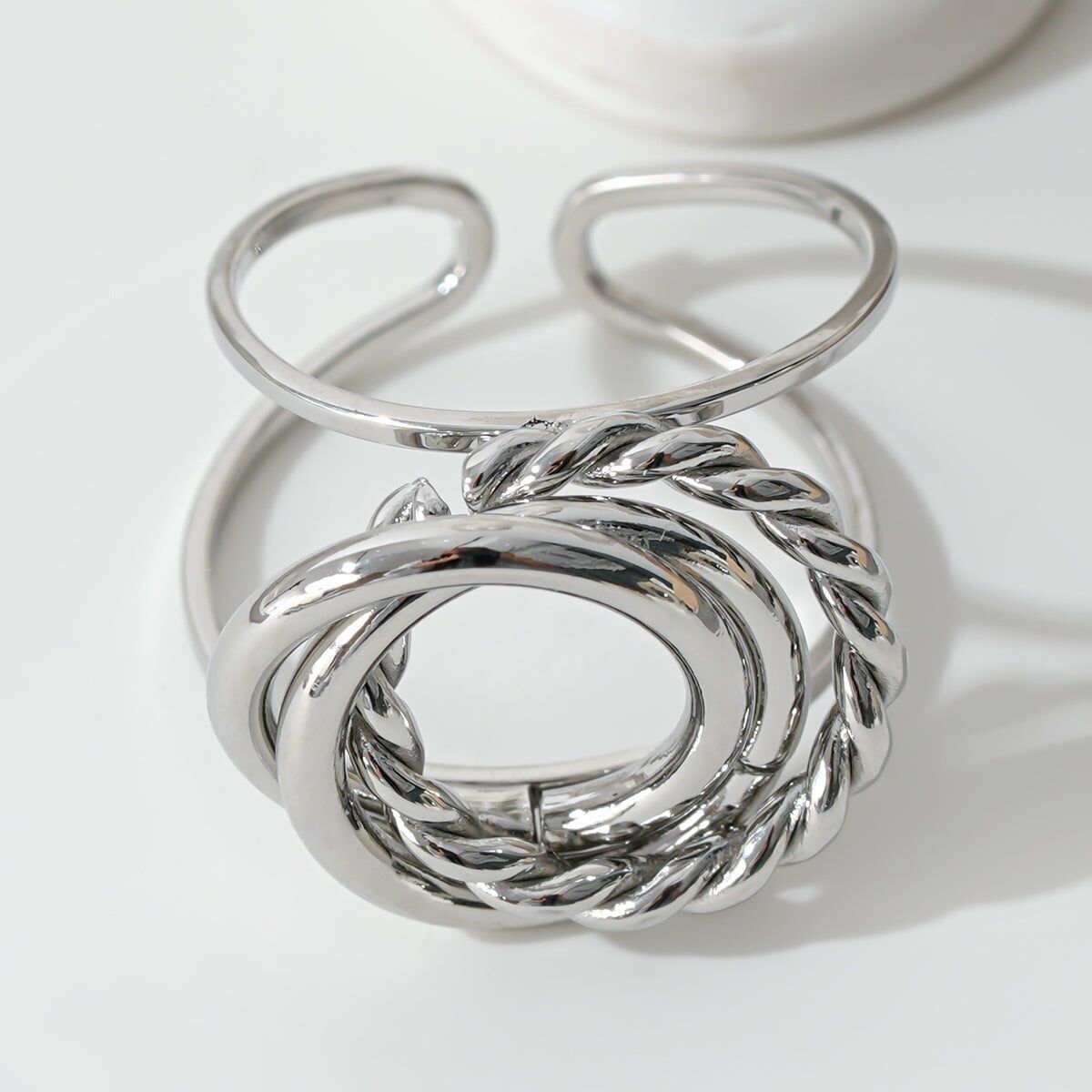 Anello In Argento Cavo Con Anelli Lisci E Intrecciati