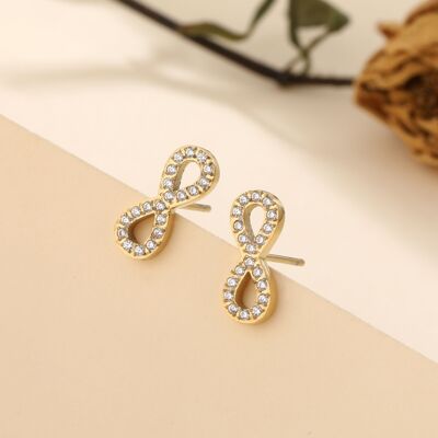Boucles d'oreilles croisées en strass. - Lilou