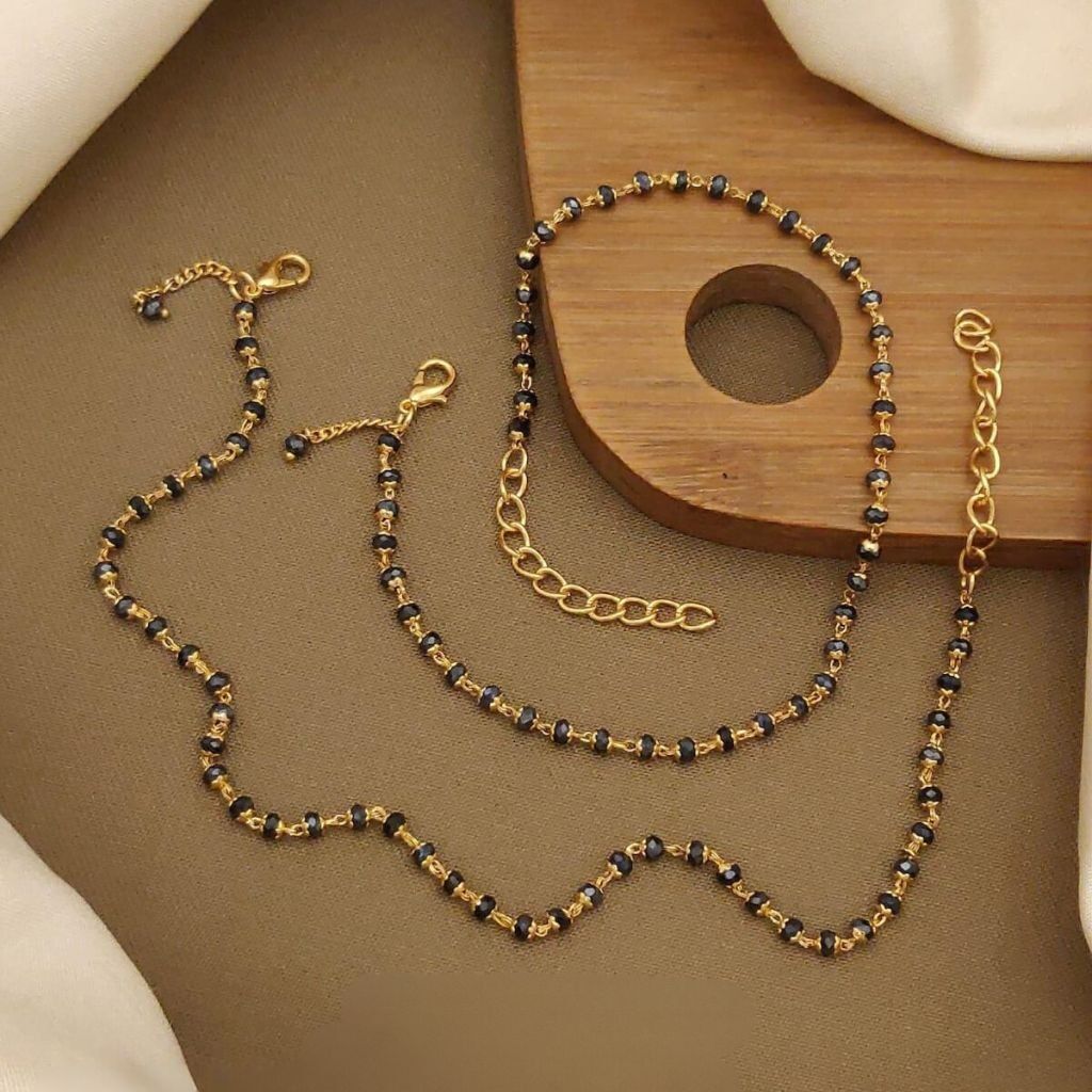 Cavigliera sottile con perline in oro nero Payal