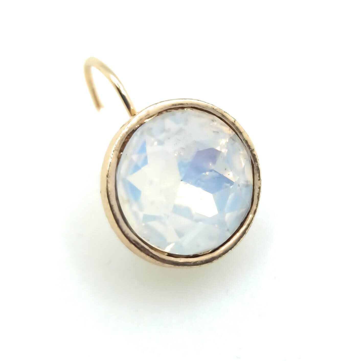 Gold Dangling Earrings Shiny Crystal · Shiny White Faceted Crystal