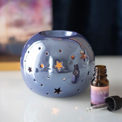 Bruciatore di oli a forma di stella viola iridescente