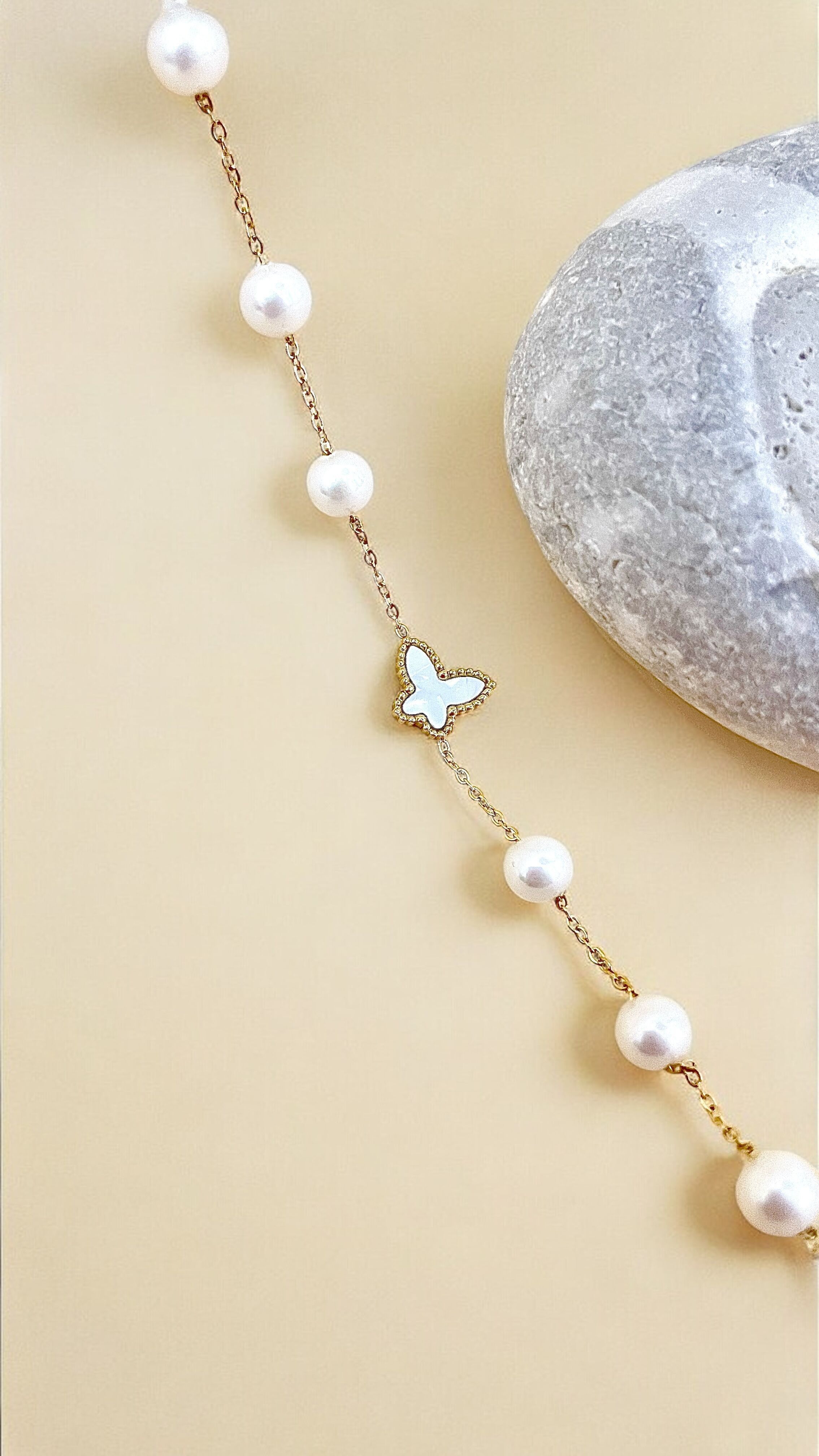 Bracelet en acier inoxydable papillon nacré et perle