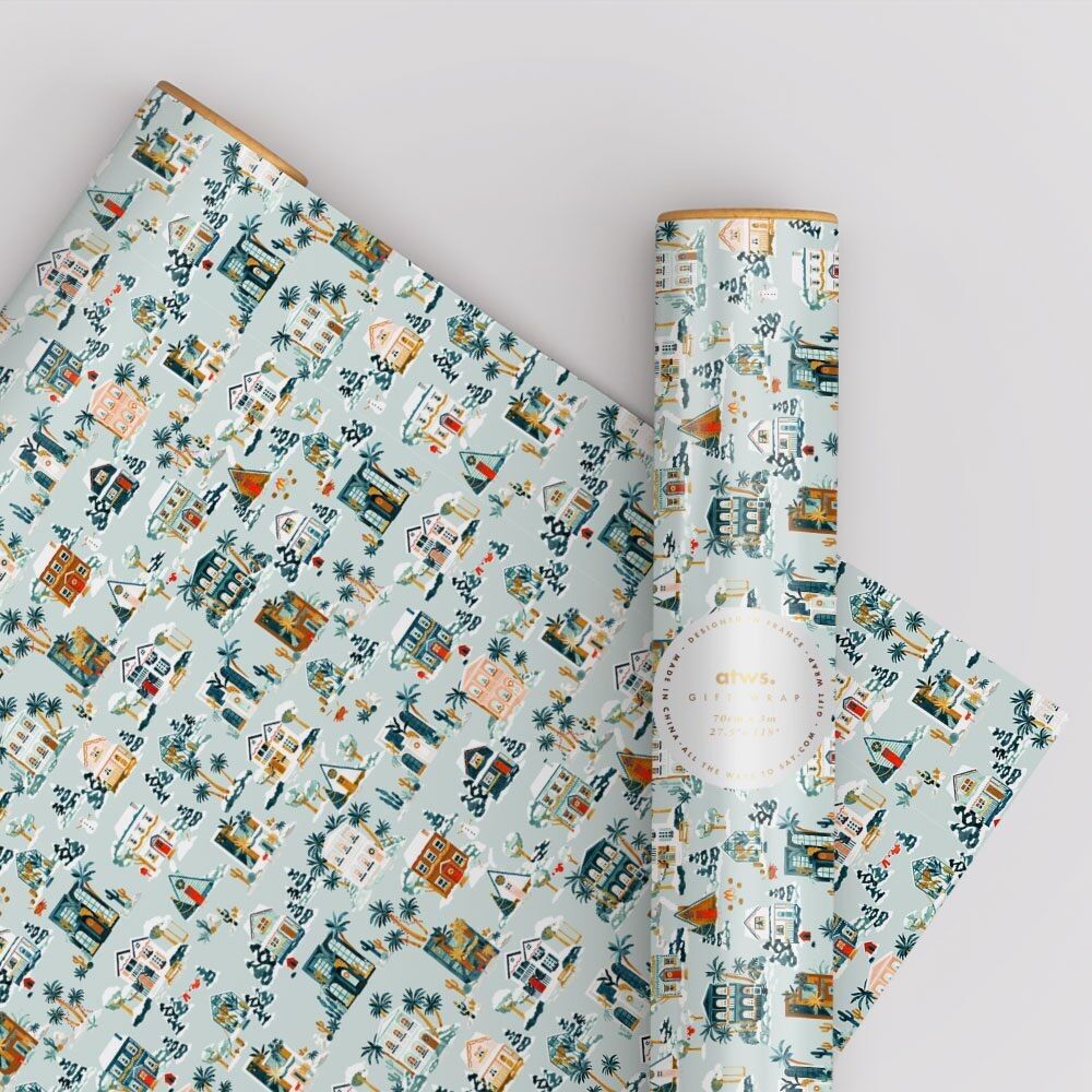 Case innevate: rotolo di carta regalo