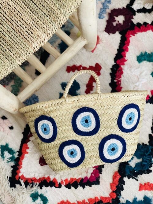 Oval Moroccan Basket with Handwoven Evil Eye Design