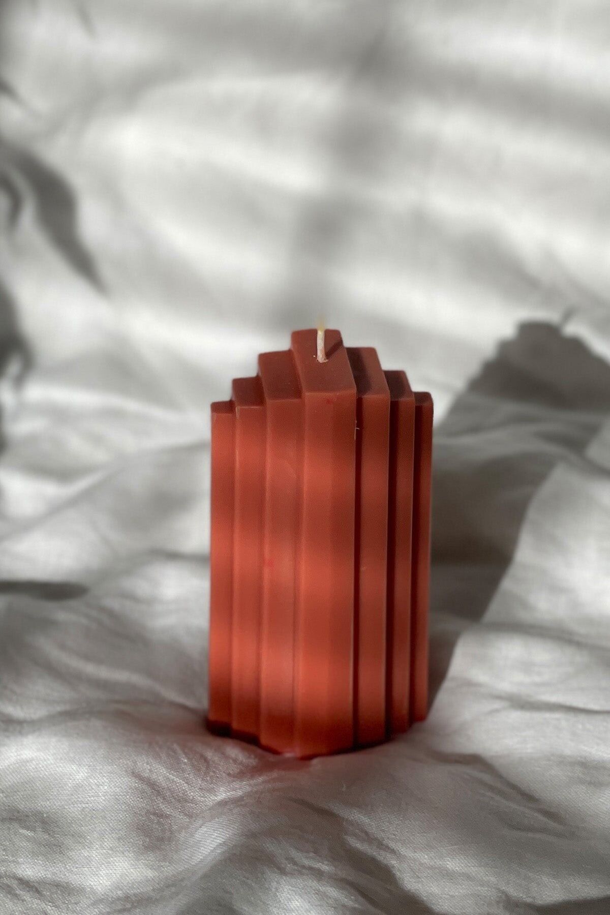 Pyramidenförmige Kerze