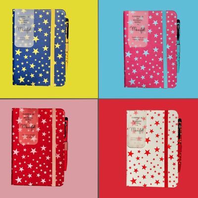 Cuaderno estampado estrellas con bolígrafo a juego