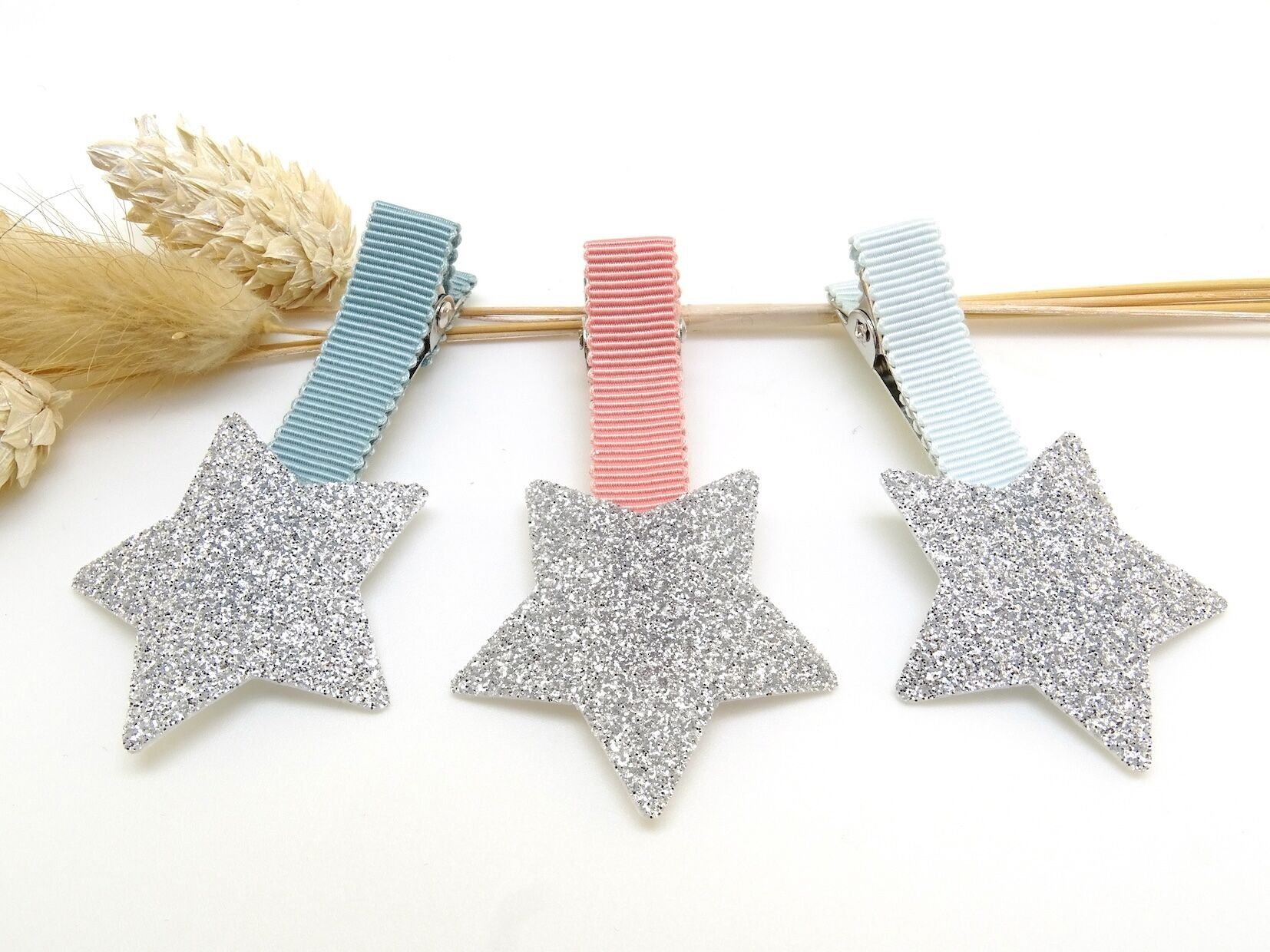 Fermaglio per capelli con stella glitterata