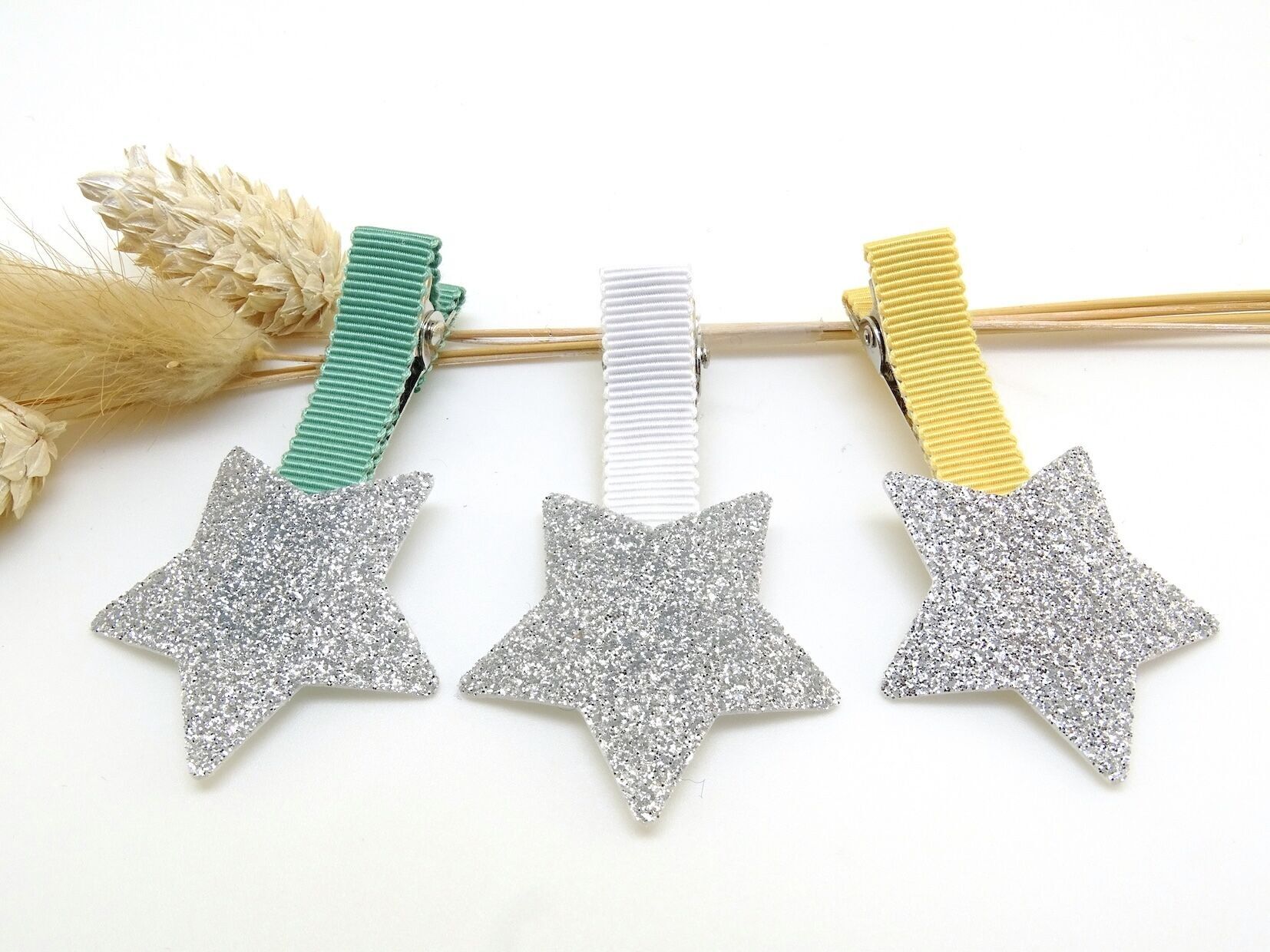 Pinza para el pelo con estrella de purpurina