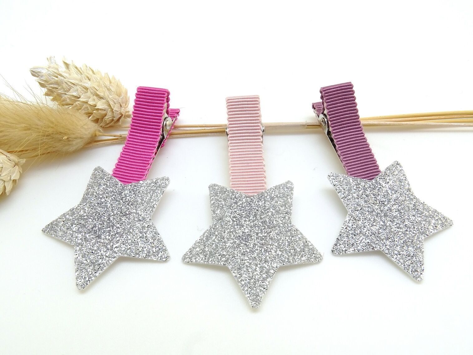 Pinza para el pelo con estrella de purpurina