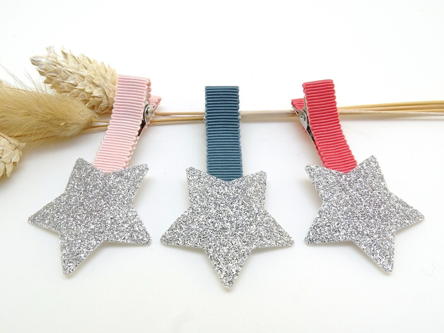 Pinza para el pelo con estrella de purpurina