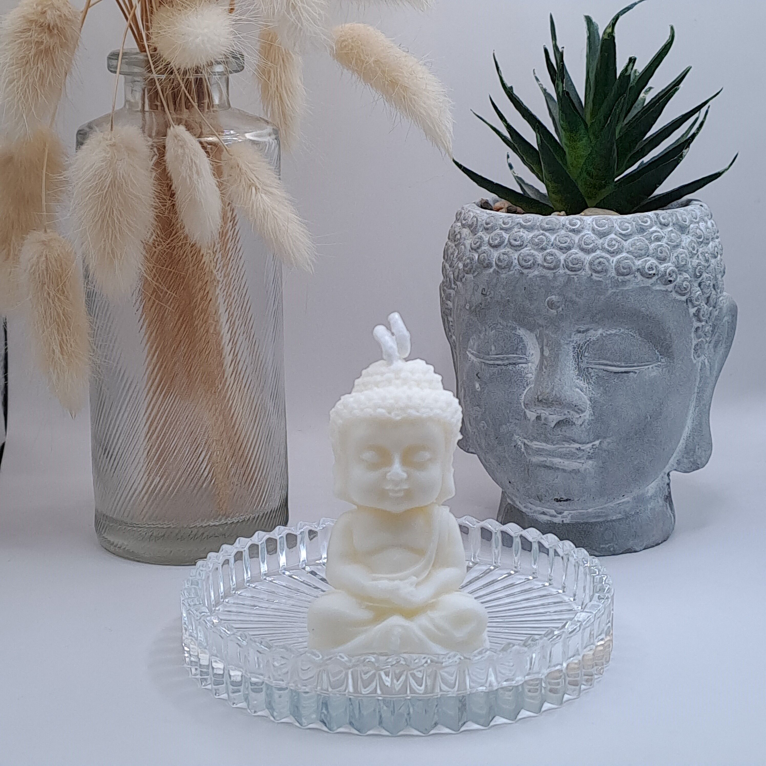 Candela modellata PETIT BUDDHA NAG CHAMPA