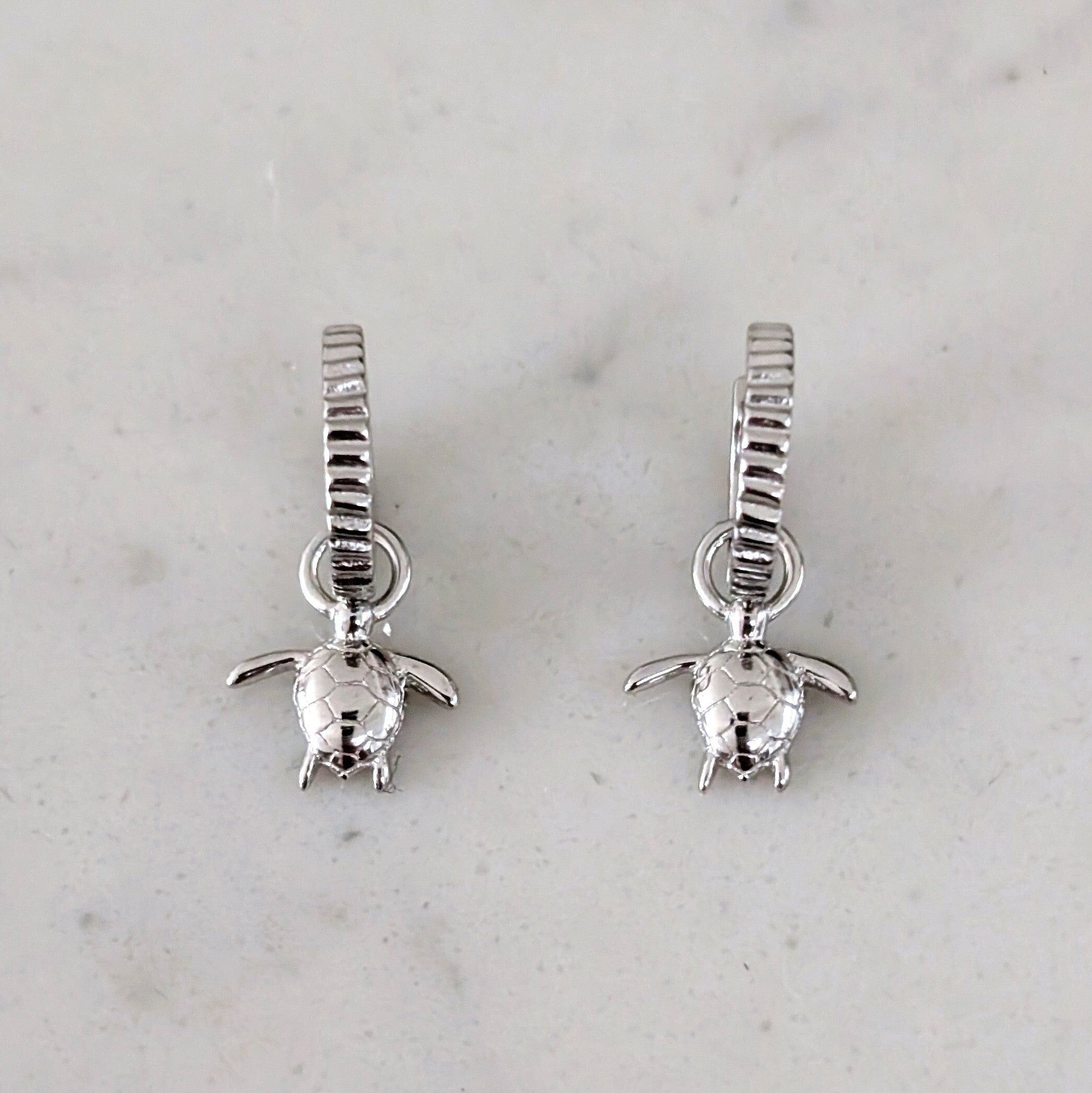 Les boucles d'oreilles de la petite tortue