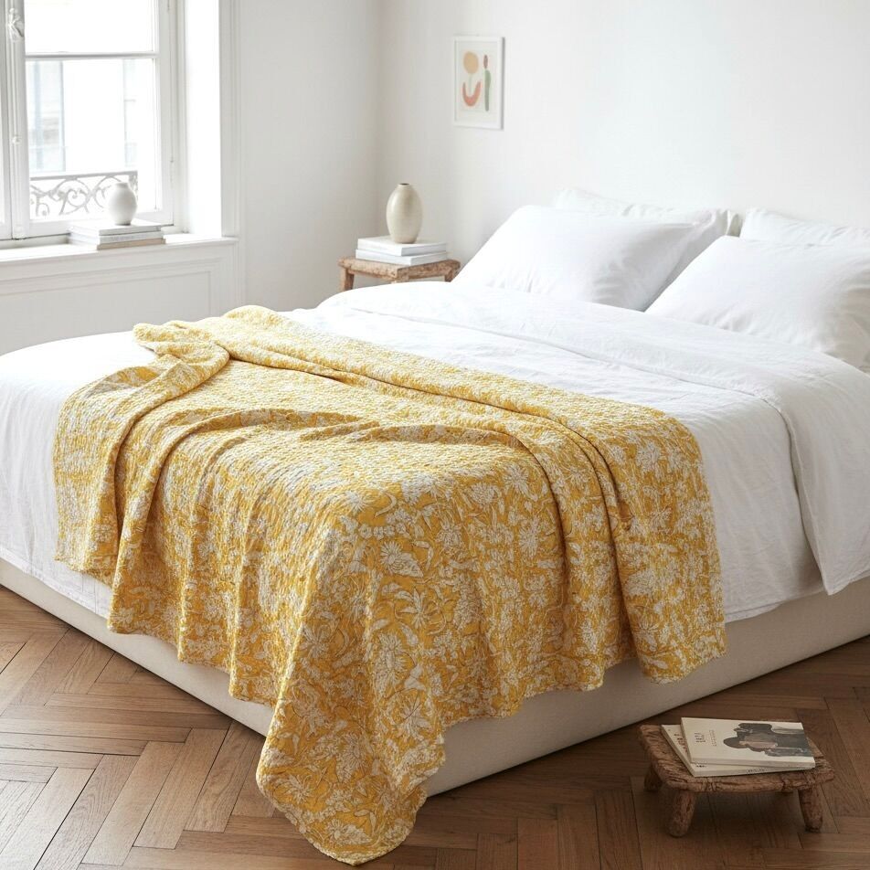 Copriletto in cotone con stampa “Pulcino”.