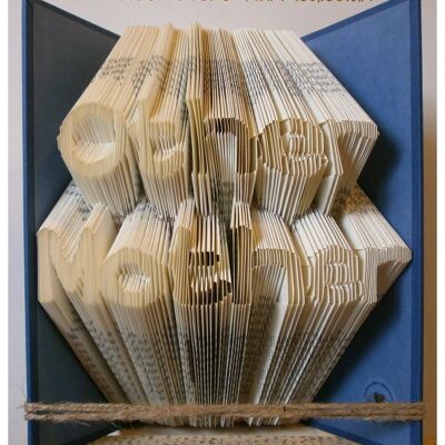 "Other Mother" : : Hand folded in to the pages of a book